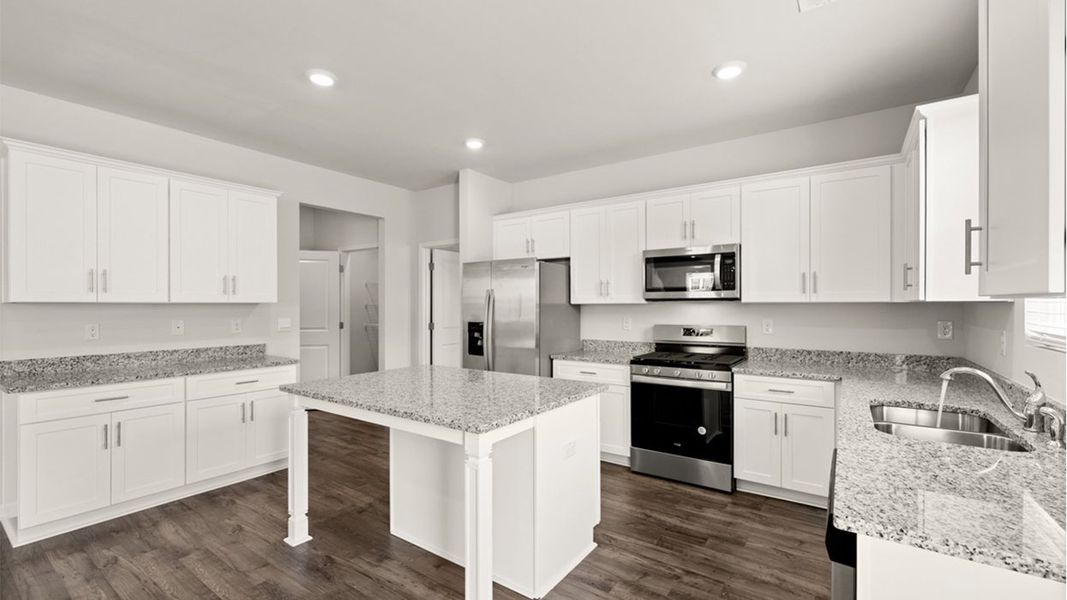Representative furnished interior of a home built from the Mansfield by D.R. Horton in Highland Hills, Graniteville (Image 5).