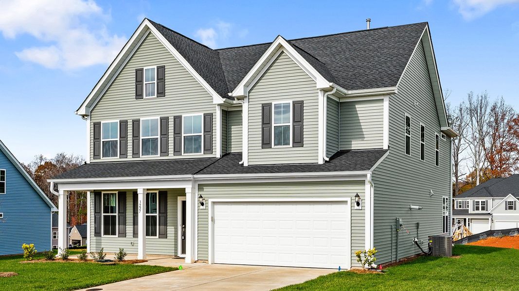 Front exterior of a new home in Hanes Lake, Winston-Salem, NC, highlighting curb appeal (Image 2).