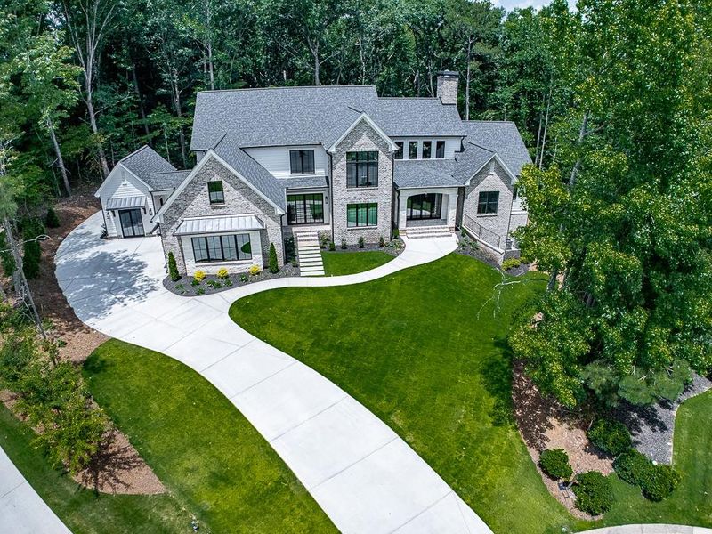Front exterior of a new home in , Ball Ground, GA, highlighting curb appeal (Image 36).