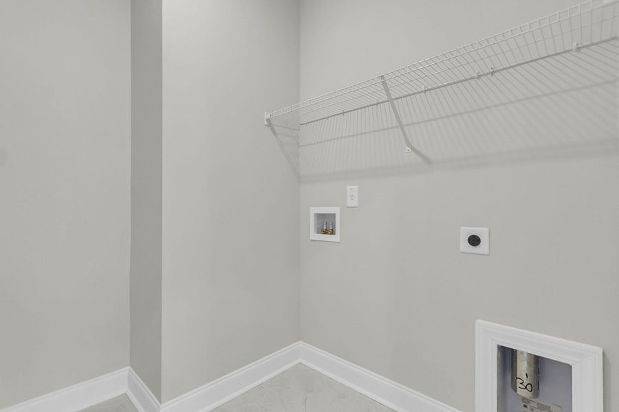 Spacious, unfurnished interior of a new home in Tidewater at Lakes of Cane Bay, Summerville (Image 11).