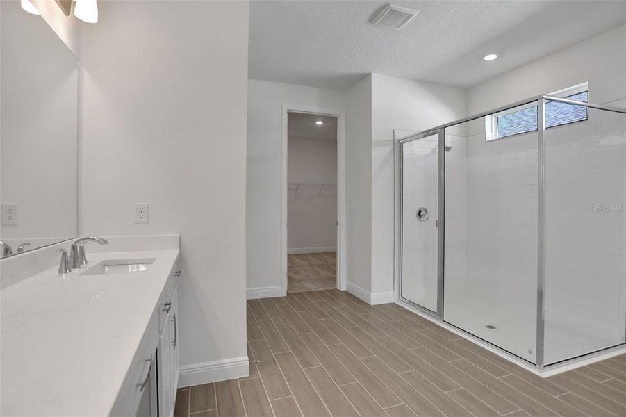 Furnished interior view inside a new home in Seaire, Parrish (Image 11).