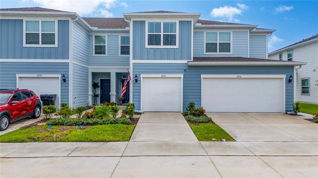 Front exterior of a new home in , Davenport, FL, highlighting curb appeal (Image 2).