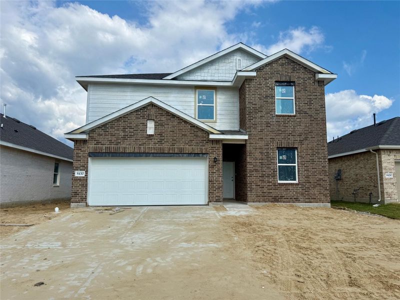 Two story home with 5 beds, 3 baths, and 2 car garage