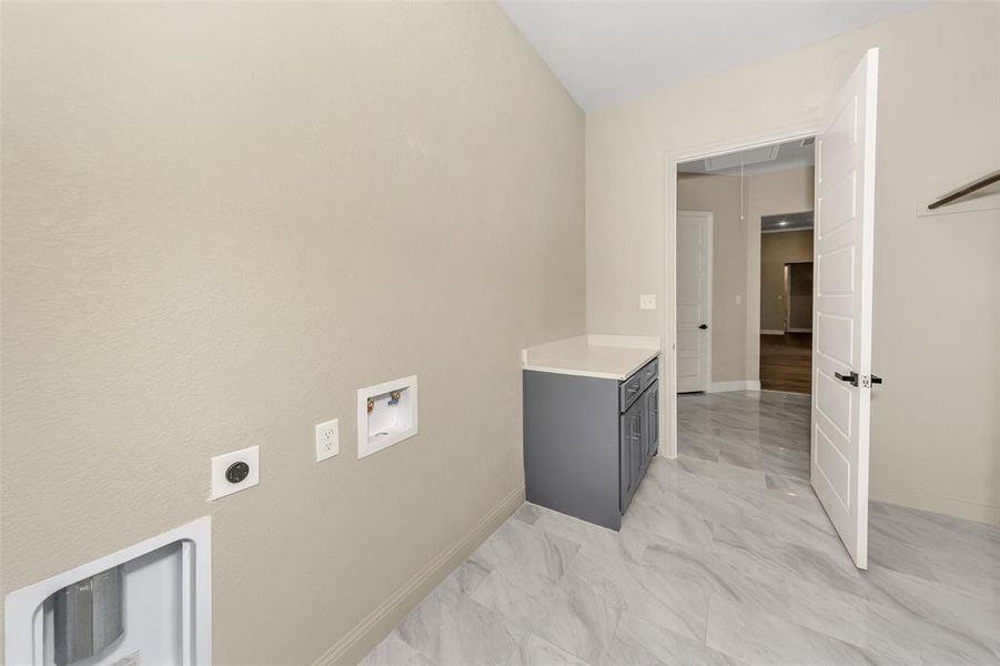 Laundry room featuring electric dryer hookup and hookup for a washing machine