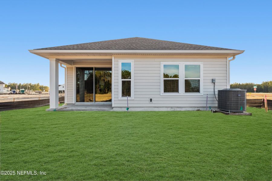 Exterior details and patio area of a home in Evergreen Island at Silverleaf - Classic, St. Augustine (Image 2). Exterior details and patio area of a home in Evergreen Island at Silverleaf - Classic, St. Augustine (Image 2).