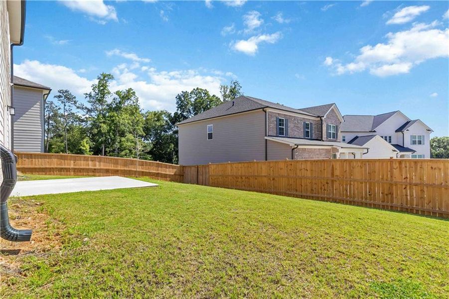 Front exterior of a new home in , Atlanta, GA, highlighting curb appeal (Image 1).
