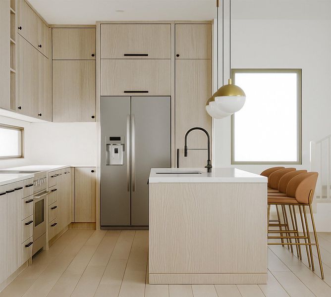 Kitchen featuring stainless steel built in fridge, light brown cabinets, light countertops, cream cabinets, and modern cabinets Kitchen featuring stainless steel built in fridge, light brown cabinets, light countertops, cream cabinets, and modern cabinets