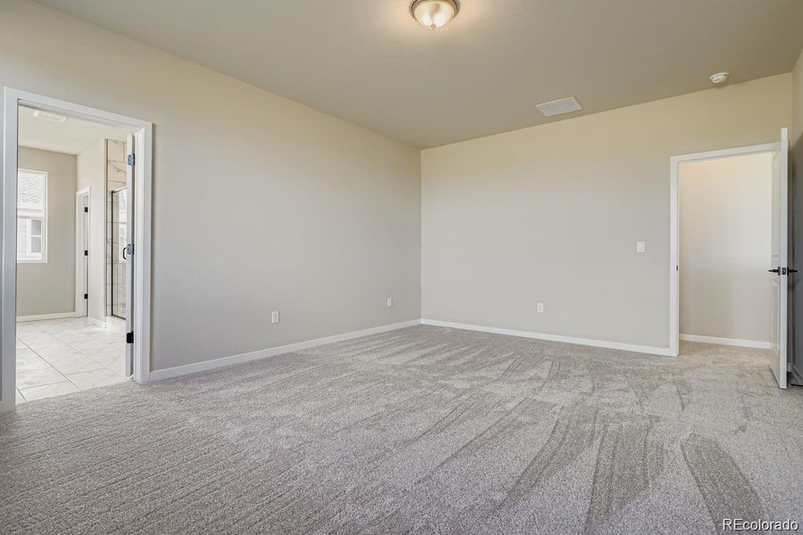 Yukon - Primary Bedroom - Picture not of actual home Yukon - Primary Bedroom - Picture not of actual home