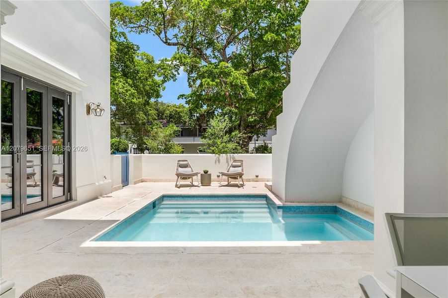 Exterior details and patio area of a home in , Coral Gables (Image 26).