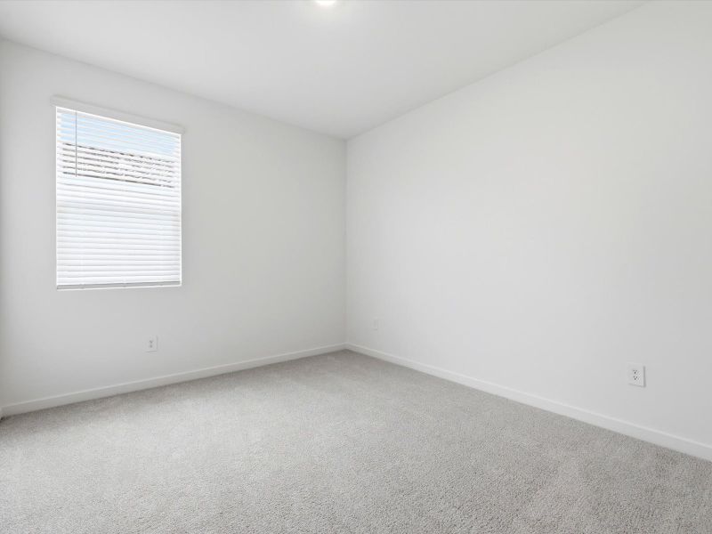 Spacious, unfurnished interior of a new home in Rancho Mirage Signature Series, Maricopa (Image 18).
