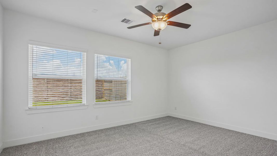 Spacious, unfurnished interior of a new home in Meridiana Townhomes, Iowa Colony (Image 22).