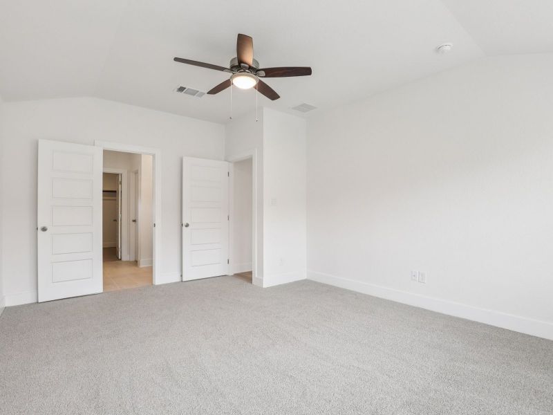 Primary bedroom in the Callaghan floorplan at a Meritage Homes community.