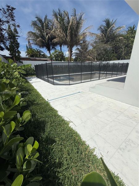 Exterior details and patio area of a home in , Miami (Image 6). Exterior details and patio area of a home in , Miami (Image 6).