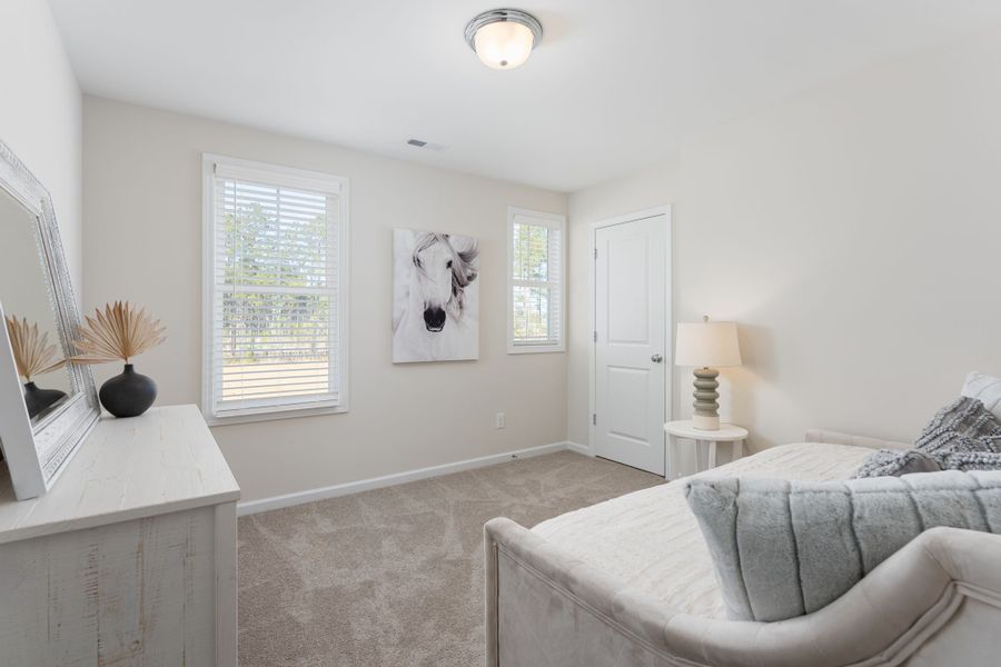 Furnished interior view inside a new home in River Tide Farms, Bolivia (Image 18).