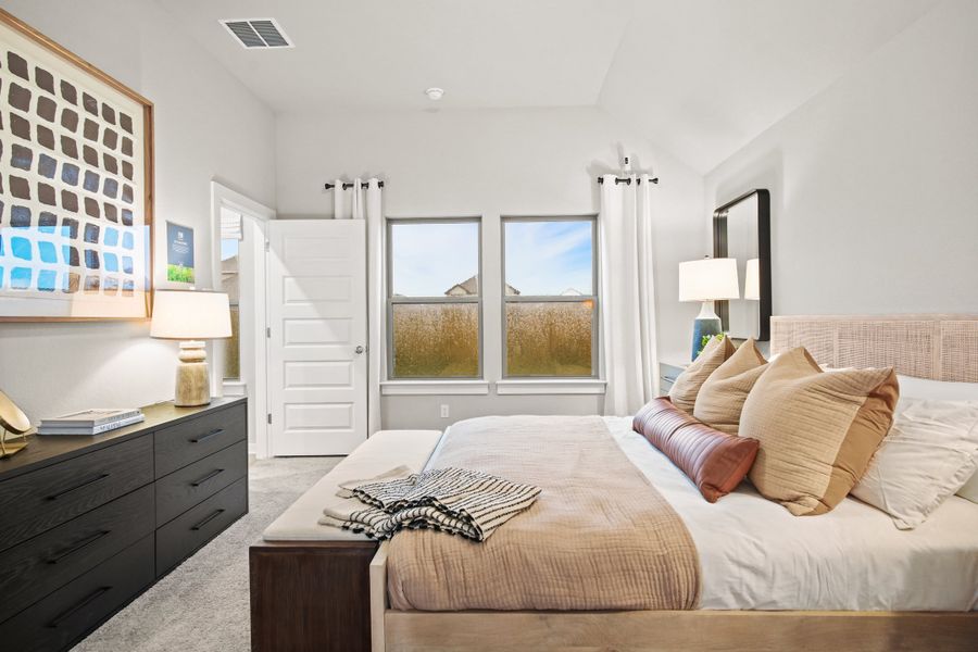 Primary Suite in the Diamond home plan by Trophy Signature Homes – REPRESENTATIVE PHOTO