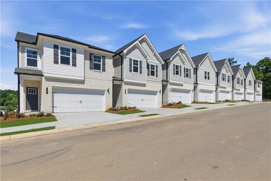 Front exterior of a new home in Diamante, Stockbridge, GA, highlighting curb appeal (Image 15).