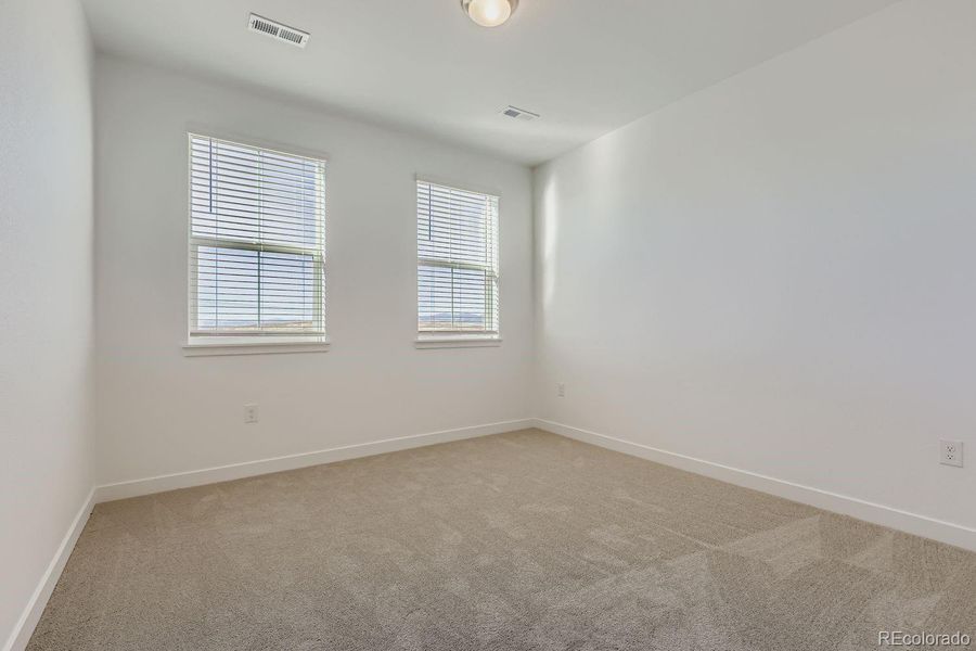 Spacious, unfurnished interior of a new home in Sunset Village: The Grand Collection, Erie (Image 12).