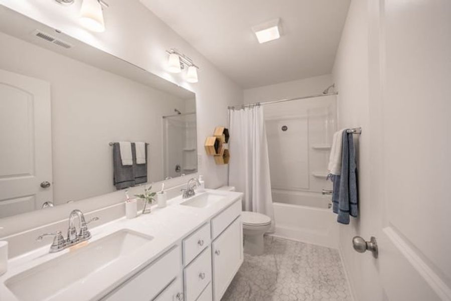 Representative furnished interior of a home built from the Hudson by True Homes in Harpers Landing, Walkertown (Image 16).