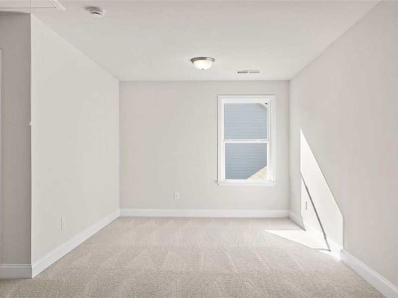 Spacious, unfurnished interior of a new home in Wehunt Meadows, Hoschton (Image 34).