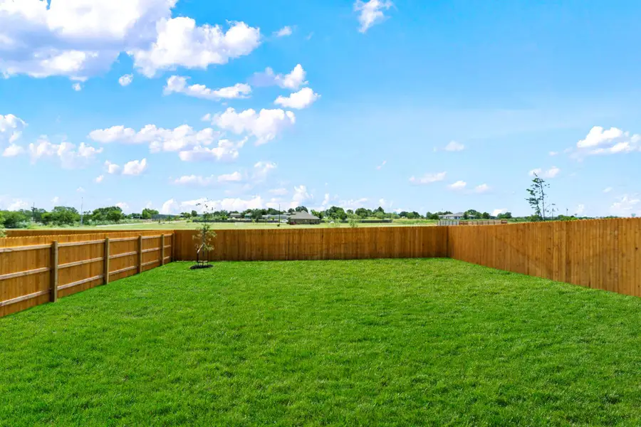 Exterior details and patio area of a home in Palomino, Manor (Image 17).
