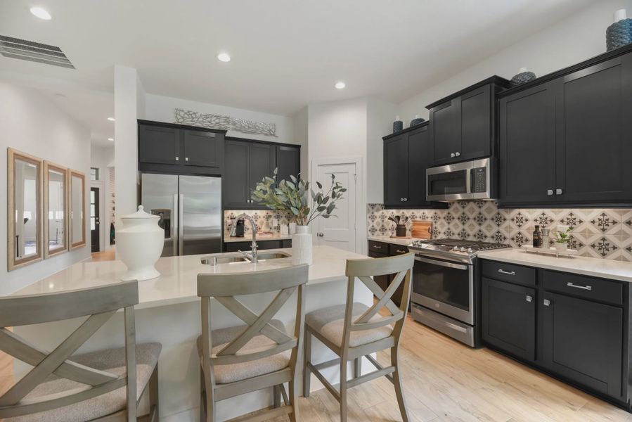 Representative furnished interior of a home built from the Athens by Chesmar Homes in Wood Leaf Reserve, Tomball (Image 5).
