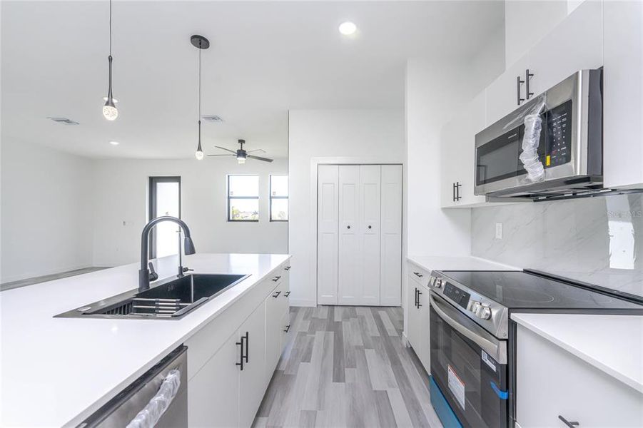 Furnished interior view inside a new home in , Port Charlotte (Image 16).