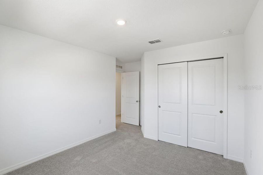 Spacious, unfurnished interior of a new home in Waterstone, Groveland (Image 45).