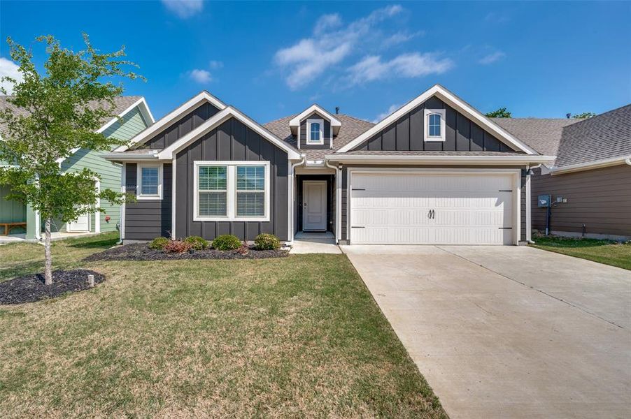 Front exterior of a new home in Enclave at Pecan Creek, Providence Village, TX, highlighting curb appeal (Image 2). Front exterior of a new home in Enclave at Pecan Creek, Providence Village, TX, highlighting curb appeal (Image 2).