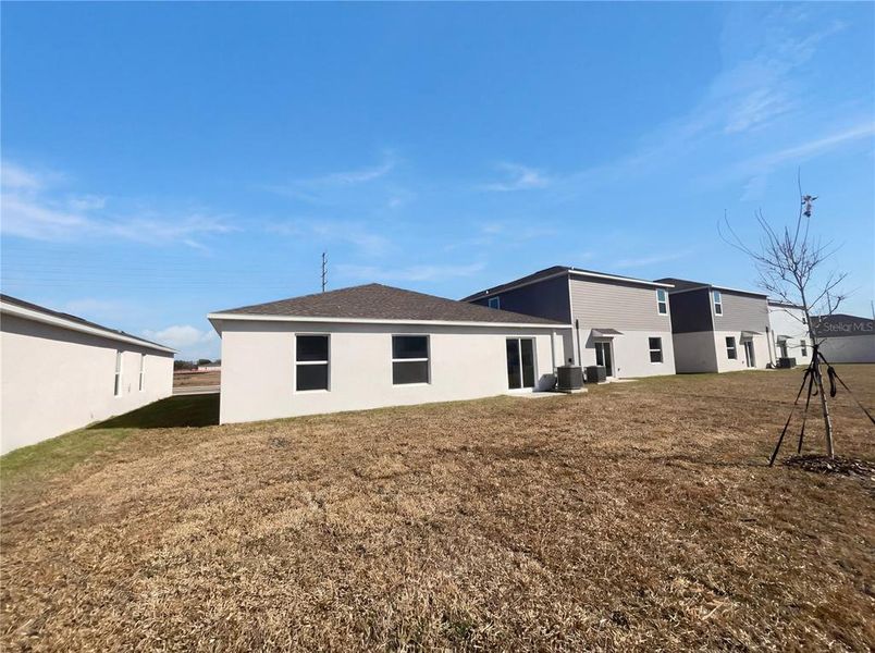 Exterior details and patio area of a home in Peace Creek Reserve, Winter Haven (Image 3).