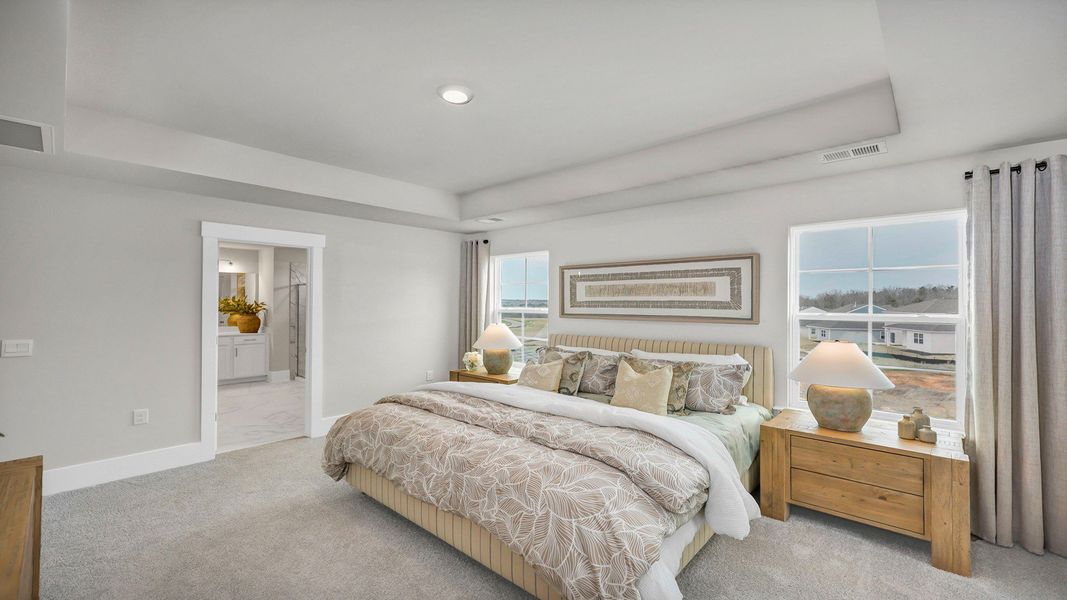Representative furnished interior of a home built from the Harbor Oak by D.R. Horton in Lake Tide Summit, Chapin (Image 37).