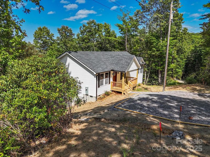 Front exterior of a new home in , Etowah, NC, highlighting curb appeal (Image 23).