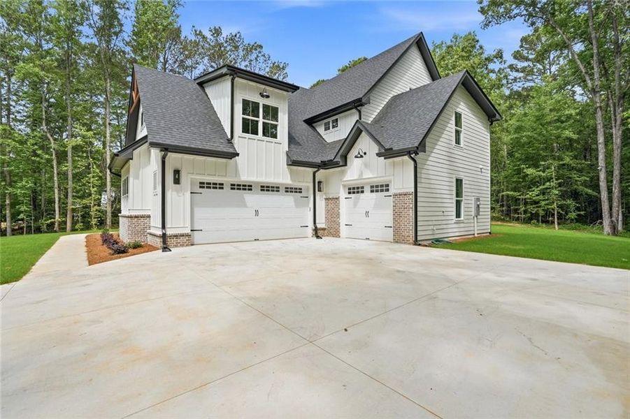 Front exterior of a new home in , Covington, GA, highlighting curb appeal (Image 30).