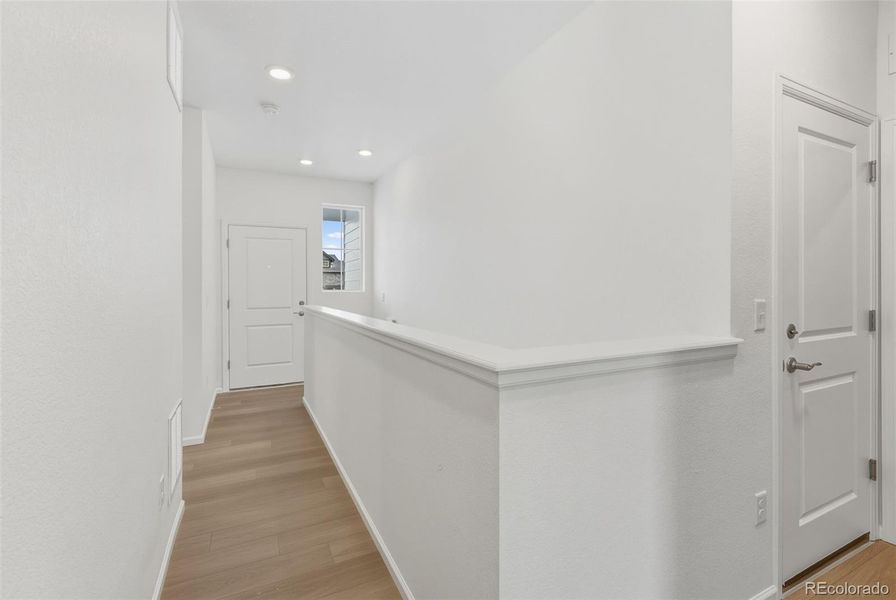 Spacious, unfurnished interior of a new home in The Cottages Collection at Ridgeline Vista, Brighton (Image 18).