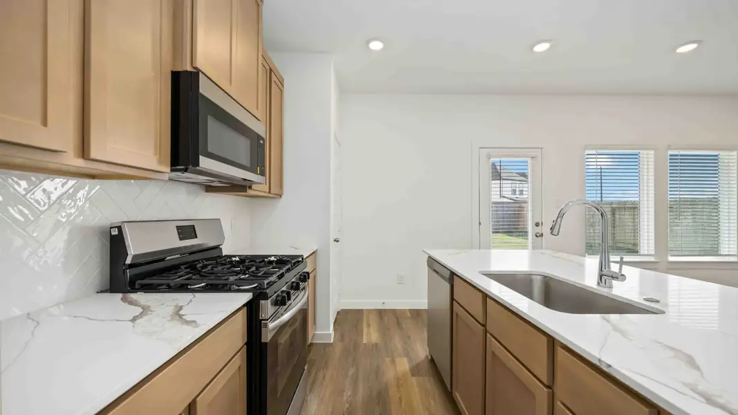 Furnished interior view inside a new home in Grand West, Houston (Image 3).
