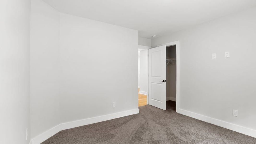 Representative unfurnished interior of a home built from the Bakersfield by D.R. Horton in Edgewood Estates, Greenville (Image 27).