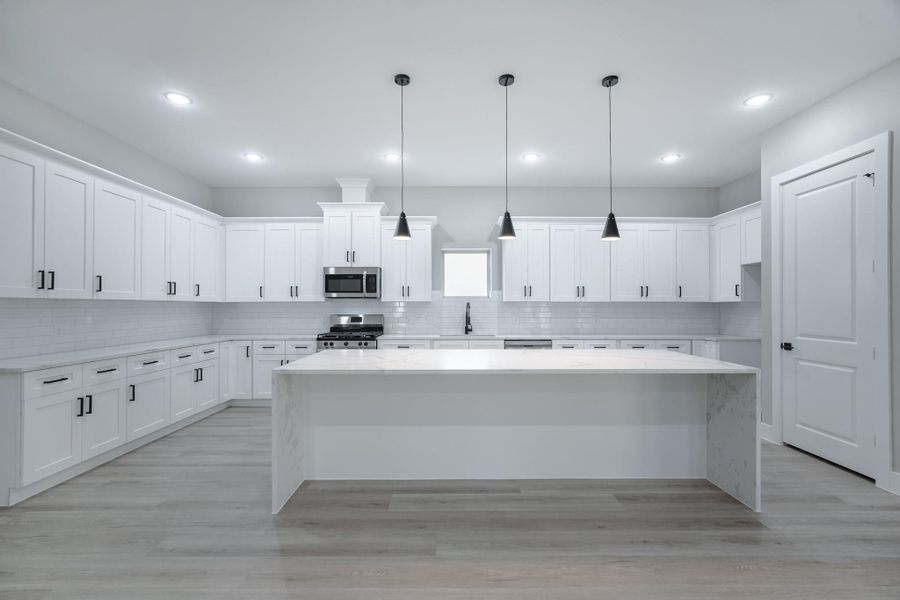Kitchen opens to family room—perfect for entertaining and daily living