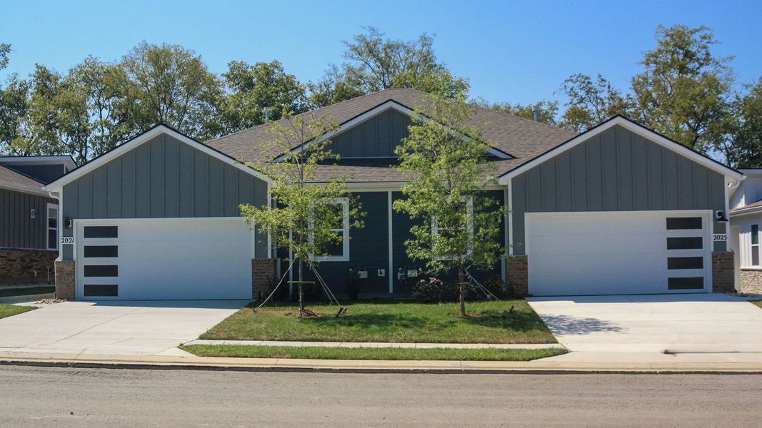 Front exterior of a new home in Nexus South, Gallatin, TN, highlighting curb appeal (Image 19). Front exterior of a new home in Nexus South, Gallatin, TN, highlighting curb appeal (Image 19).