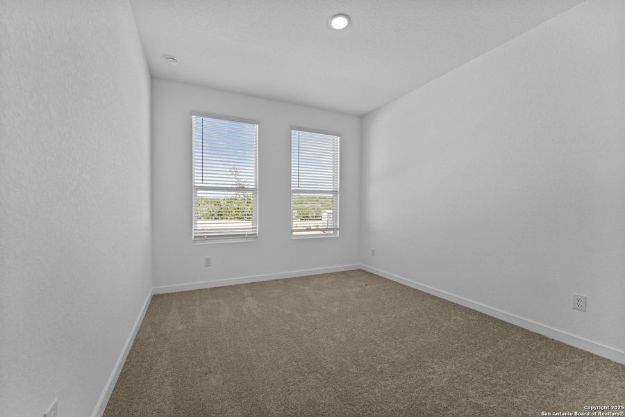 Spacious, unfurnished interior of a new home in Waterwheel: Coastline Collection, San Antonio (Image 20).