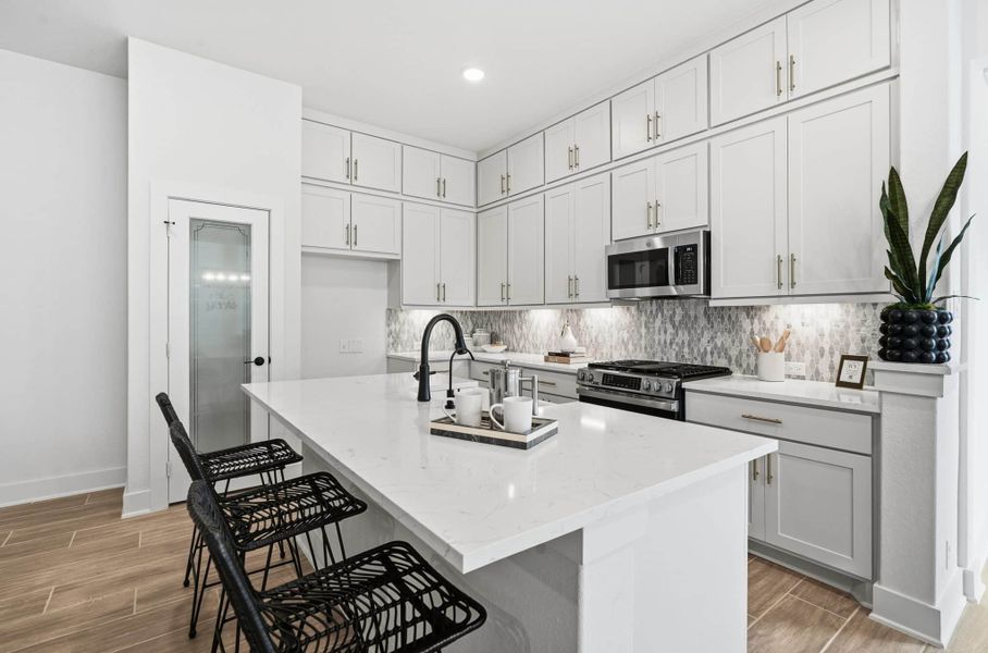 Furnished interior view inside a new home in Centero at Stone Oak, San Antonio (Image 12).