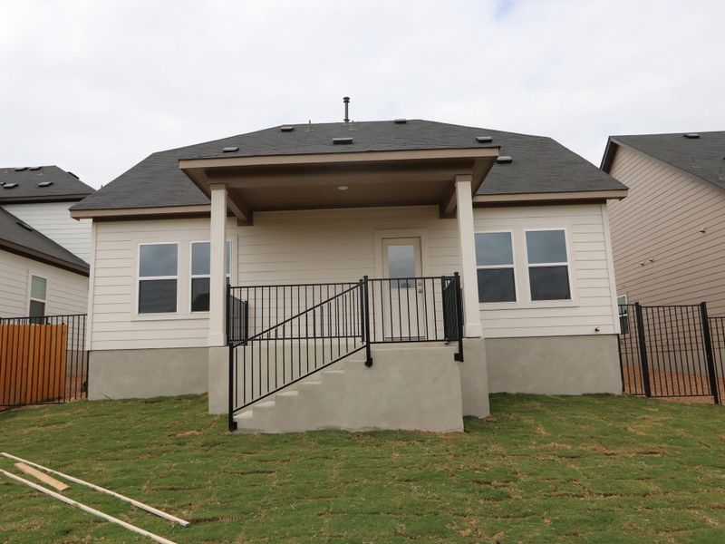 Exterior details and patio area of a home in Cascades at Onion Creek, Austin (Image 13).