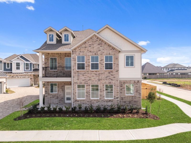Front exterior of a new home in Sienna, Missouri City, TX, highlighting curb appeal (Image 19).