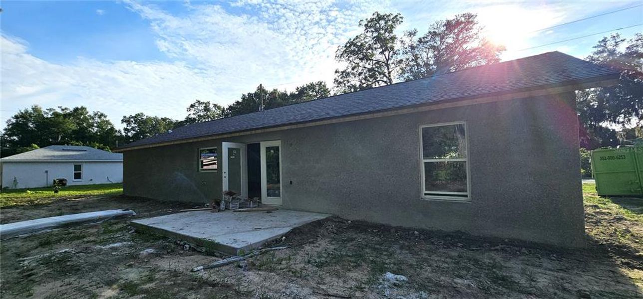 Front exterior of a new home in , Ocala, FL, highlighting curb appeal (Image 1).