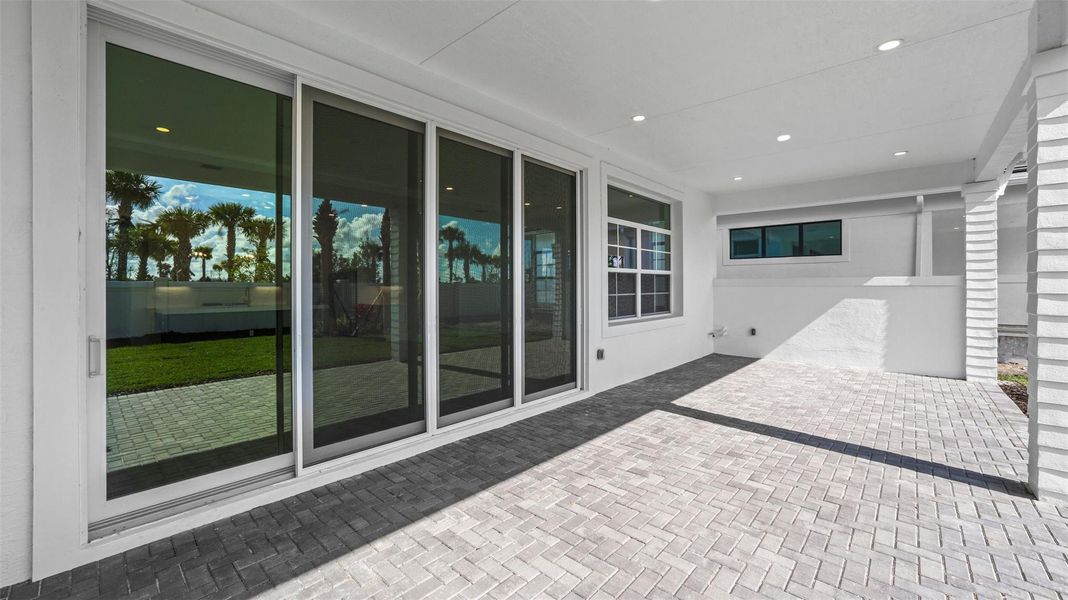 Exterior details and patio area of a home in Esprit at Avenir, Palm Beach Gardens (Image 28).