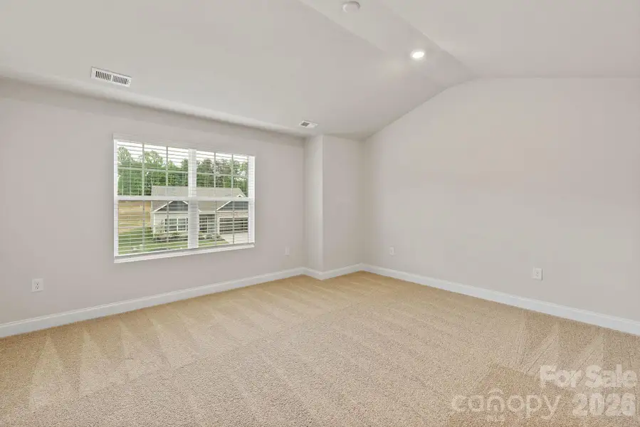 Spacious, unfurnished interior of a new home in Ascot Woods, Charlotte (Image 10).