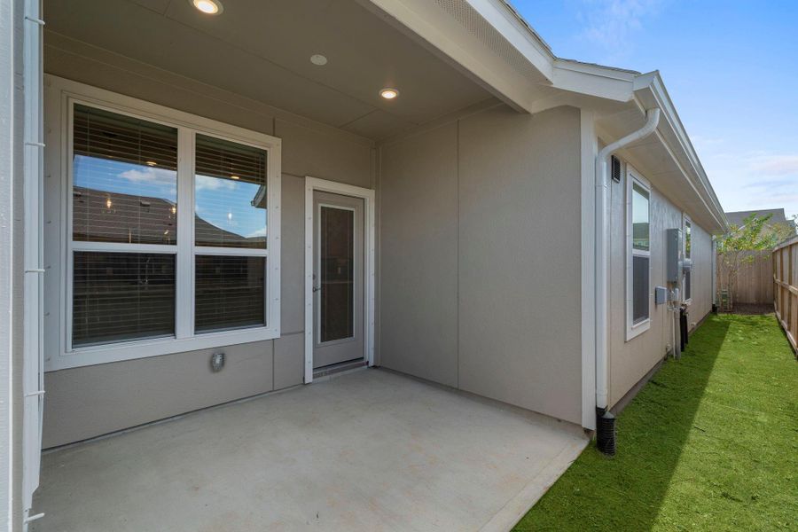 Exterior details and patio area of a home in Meridiana, Iowa Colony (Image 2).