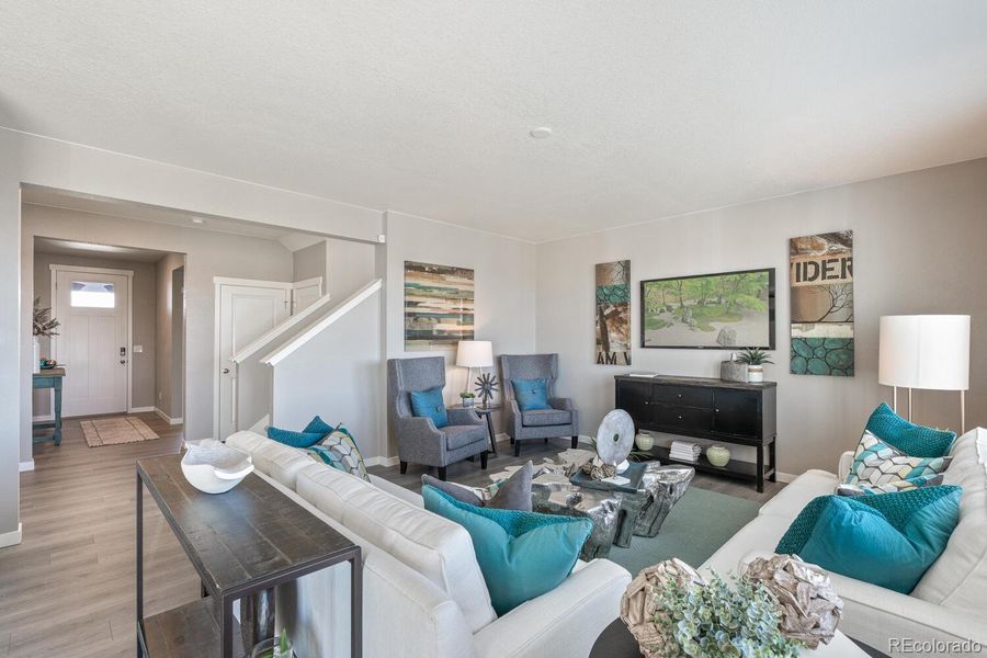 Furnished interior view inside a new home in Trails at Crowfoot, Parker (Image 8).