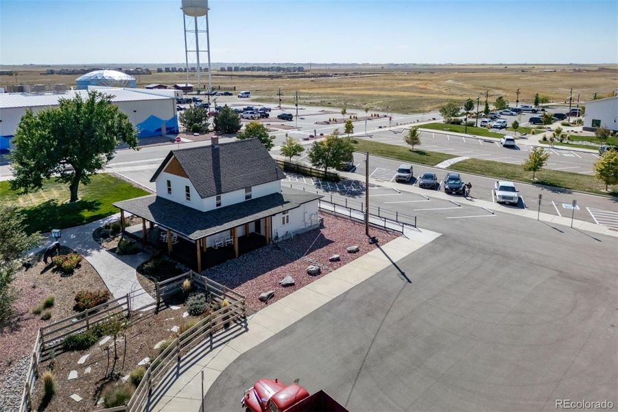 Front exterior of a new home in Muegge Farms, Bennett, CO, highlighting curb appeal (Image 21). Front exterior of a new home in Muegge Farms, Bennett, CO, highlighting curb appeal (Image 21).