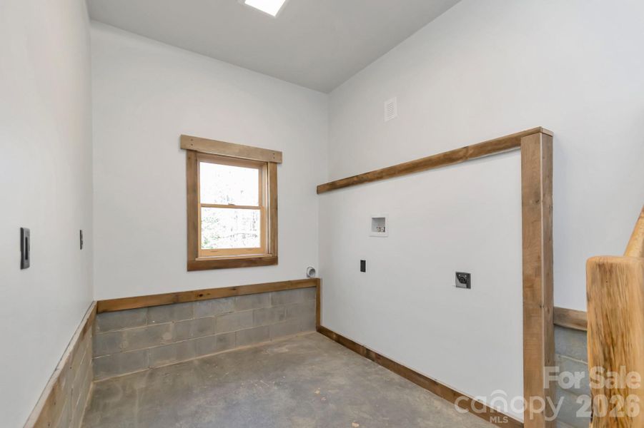 Laundry and Mud Room off Kitchen and Garage