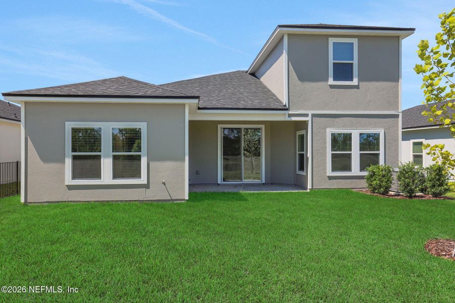 Exterior details and patio area of a home in Cordova Palms, St. Augustine (Image 27). Exterior details and patio area of a home in Cordova Palms, St. Augustine (Image 27).