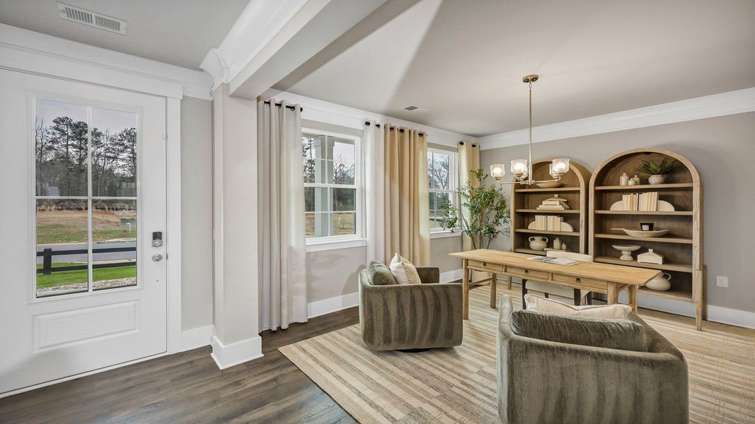 Representative furnished interior of a home built from the Harbor Oak by D.R. Horton in Lake Tide Summit, Chapin (Image 7).
